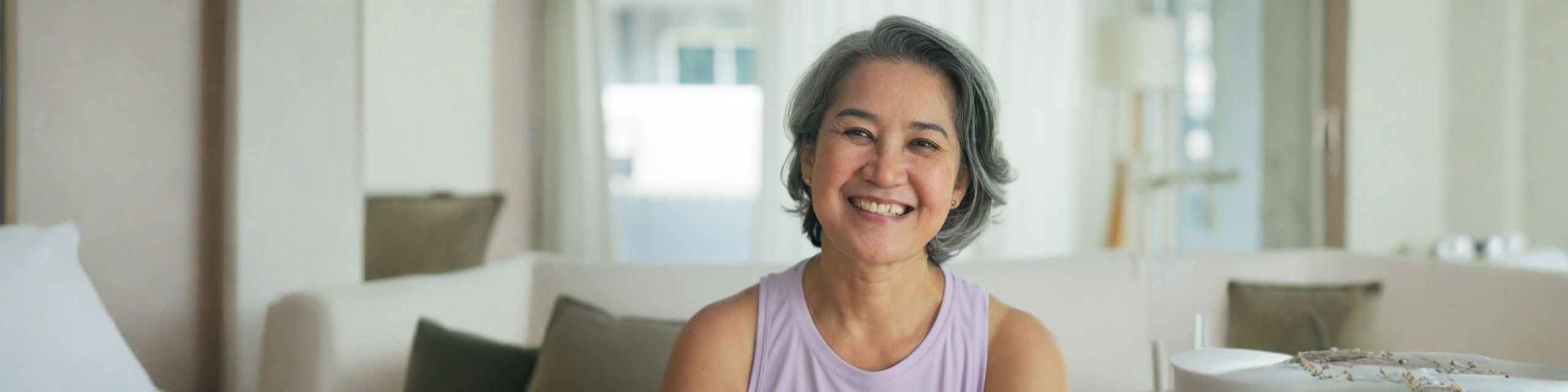 happy woman smiling at camera