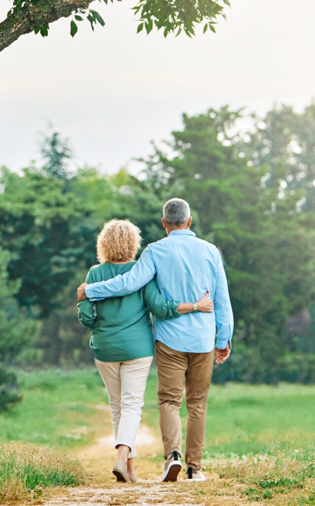 couple walking outside away from camera